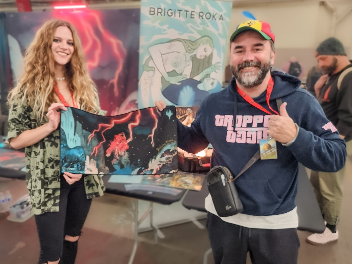 Filippo Lietti, owner of MTGPlaymats, with Brigitte Roka.