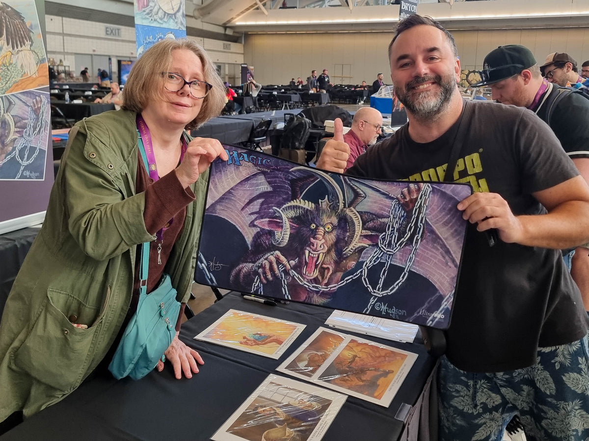 Filippo Lietti, owner of MTGPlaymats, with Heather Hudson.