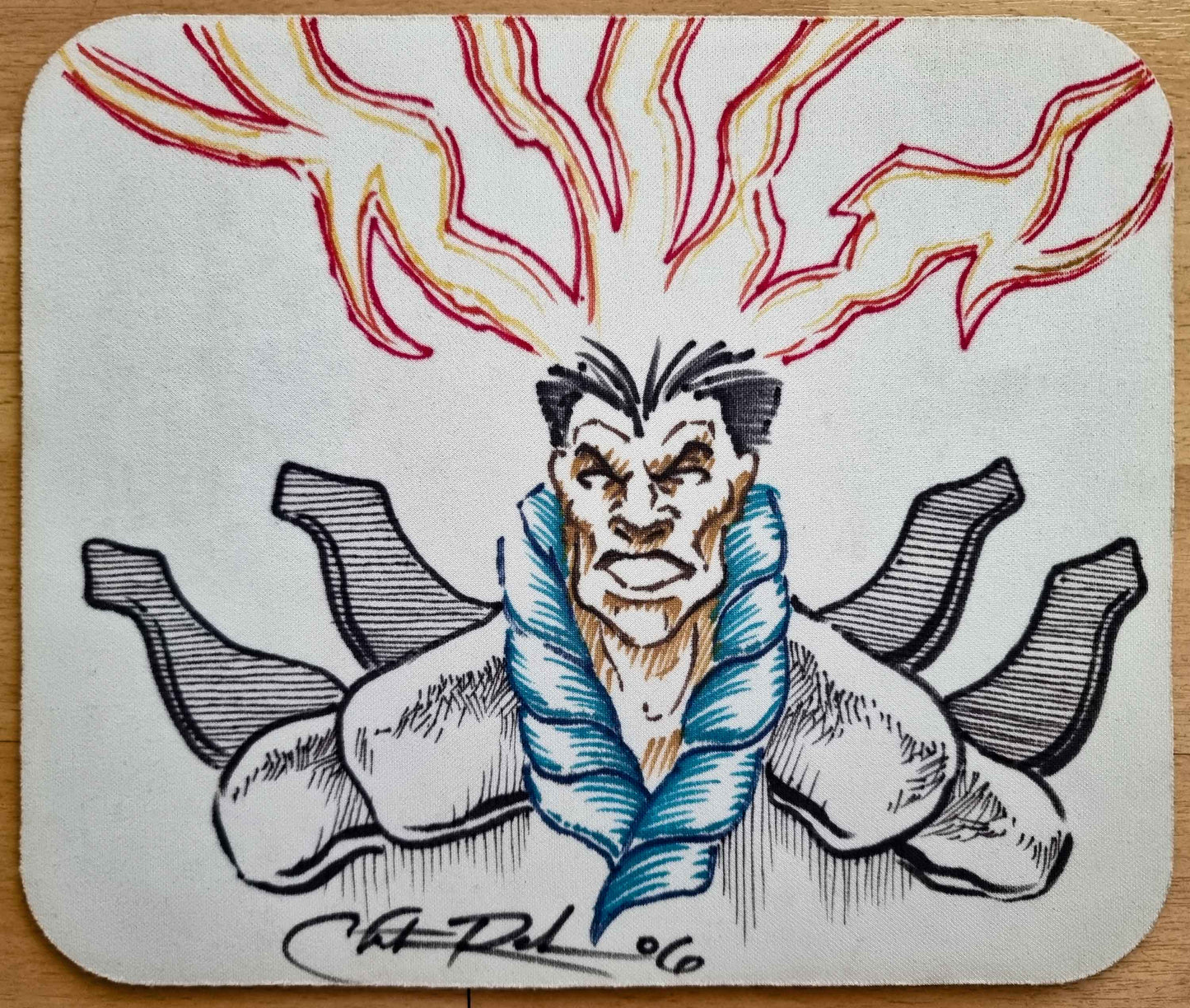 Christopher Rush Brainstorm original art mouse pad showing a hand-drawn figure with glowing eyes and red and yellow energy arcs, signed © Chris Rush ’06.