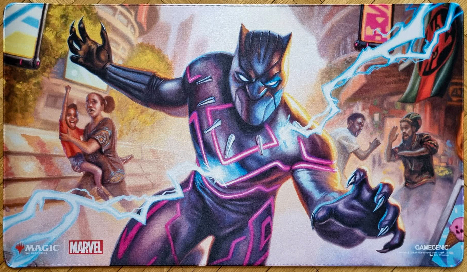 Magic: The Gathering x Marvel shiny playmat featuring Eric Wilkerson’s Black Panther, Hope Enduring artwork, showing Black Panther charging forward with glowing blue and magenta kinetic energy.