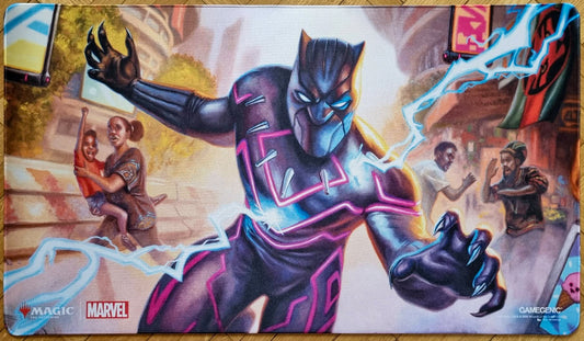 Magic: The Gathering x Marvel shiny playmat featuring Eric Wilkerson’s Black Panther, Hope Enduring artwork, showing Black Panther charging forward with glowing blue and magenta kinetic energy.