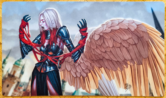 Signed Bloodborne Unlimited Studio Edition playmat by rk post, showing a pale winged figure bound in red against a blurred architectural background.