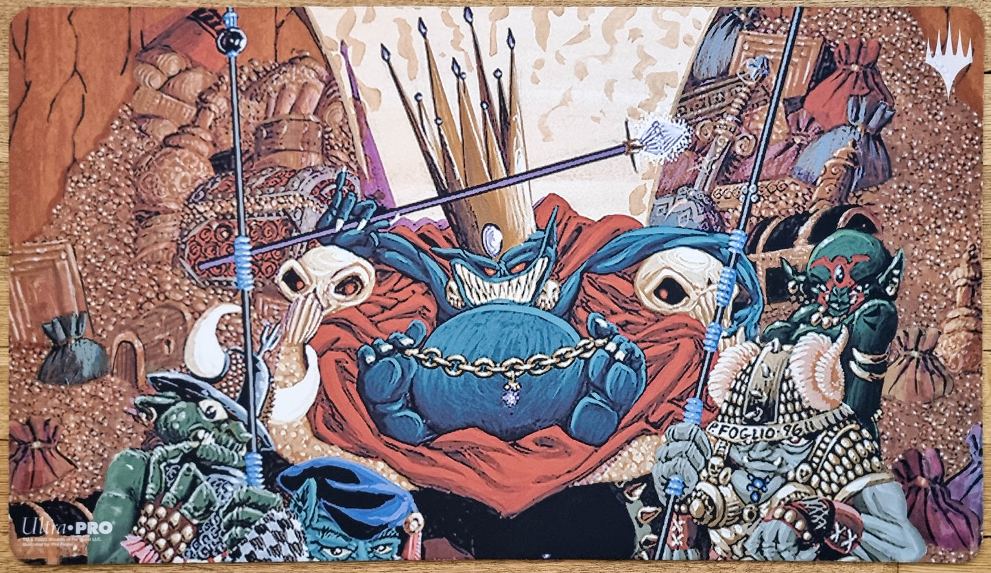 Goblin King MTG playmat by Phil Foglio showing a crowned goblin ruler surrounded by goblins, spears, treasure, and chaotic court details.
