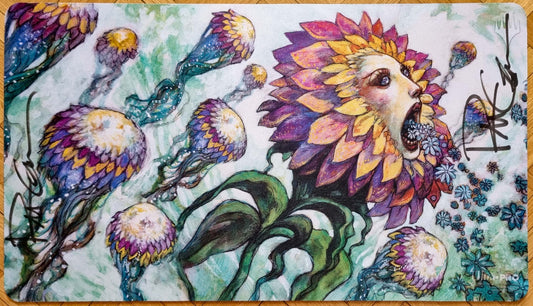 Signed Hana Kami MTG playmat featuring Rebecca Guay’s Champions of Kamigawa artwork, showing a colorful flower spirit surrounded by curling plants and blossoms.