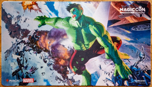 Hulk, Gamma Goliath stitched playmat by Zezhou Chen, showing Hulk smashing through debris with MagicCon Amsterdam 2026 exclusive event branding.