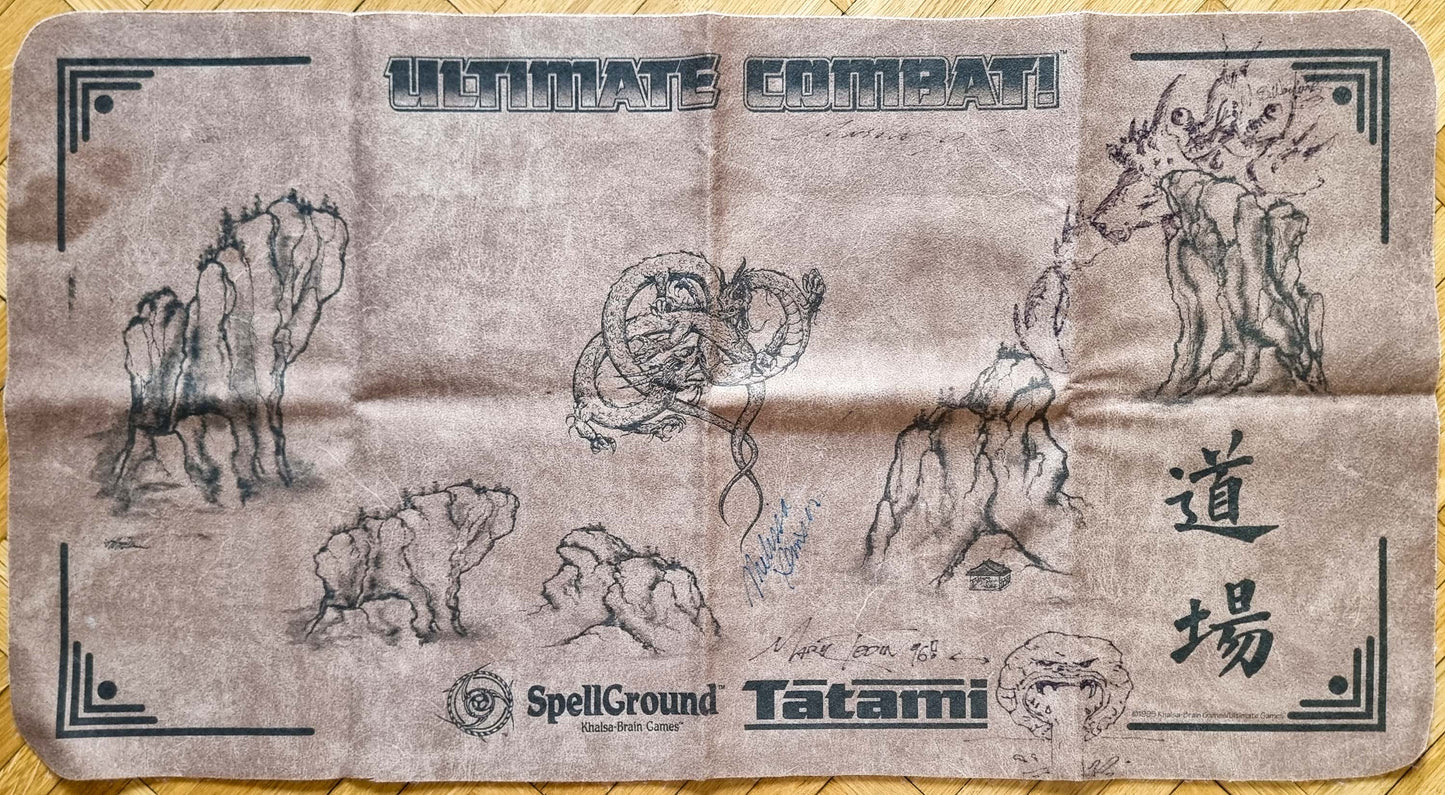 Vintage Ultimate Combat Tatami Spellground playmat by Khalsa Brain Games, multi-signed and sketched by classic MTG artists, with dragon, cliffs, dōjō calligraphy, Chaos Orb and Homarid sketches.