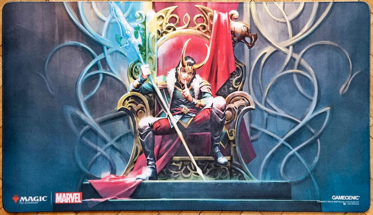 Magic: The Gathering x Marvel Loki Laufeyson playmat featuring Julia Vasilyeva’s artwork, showing Loki on an ornate throne with a glowing blue spear and stitched edges.