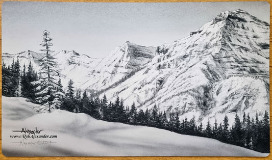 Signed black-and-white Taiga MTG playmat by Rob Alexander showing a mountain range, forest line, and snowy landscape.