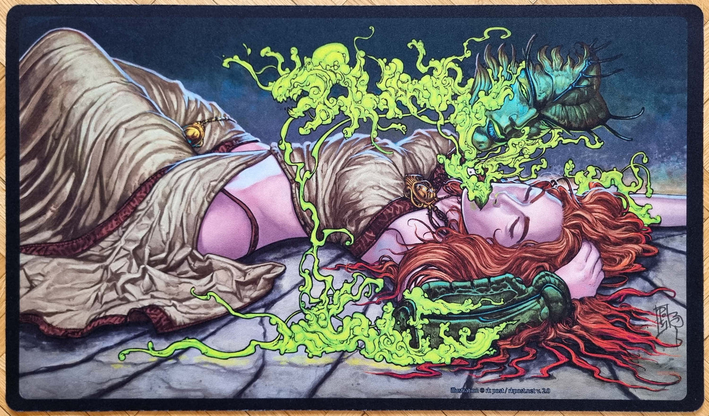 The Kiss 2.0 playmat by rk post, showing a red-haired figure surrounded by vivid green magical energy in a dark surreal fantasy scene.
