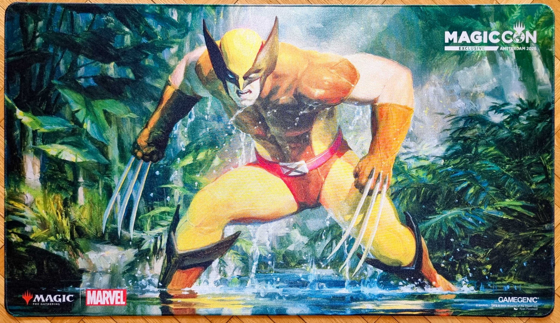 MagicCon Amsterdam 2026 exclusive shiny stitched playmat featuring Wolverine, Claws Out by Ryan Pancoast, showing Wolverine crouched in a jungle with claws extended.