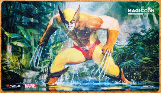 MagicCon Amsterdam 2026 exclusive shiny stitched playmat featuring Wolverine, Claws Out by Ryan Pancoast, showing Wolverine crouched in a jungle with claws extended.